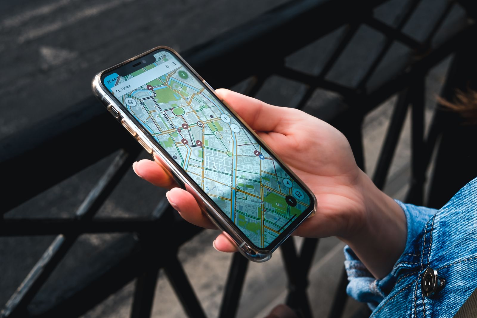 Hand holding a smartphone map
